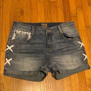 Medium washed Shorts with ties on the sides!!